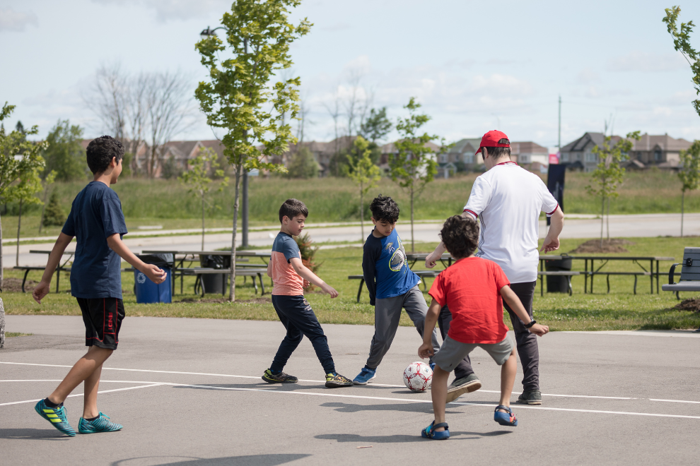 Photo of kids playing soccer